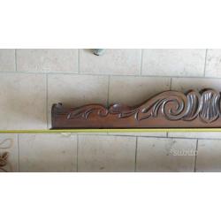 Ferma tende in legno lavorato